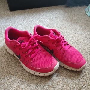 Pink Nike free runs 5.0